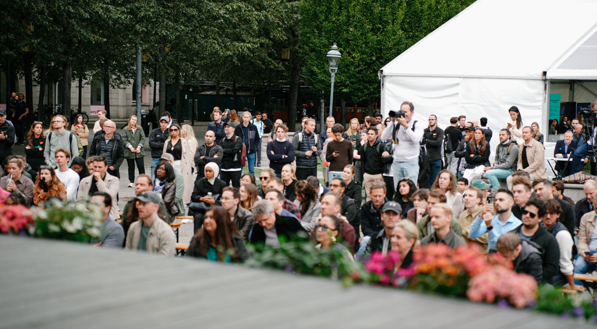 Crowd around the main tent at Tech Open